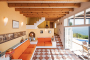 Lounge with doors opening to terrace / pool area